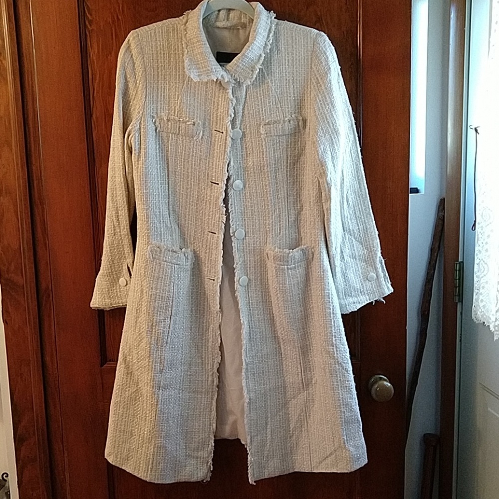 Tan and white coat